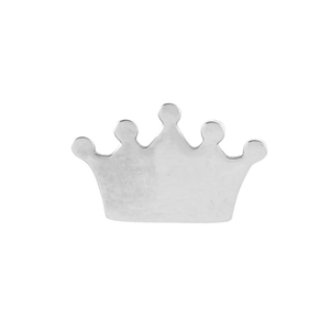 Macro detail of a silver stainless steel crown pendant with polished metal finish