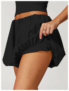 Detailed view of black bubble hem yoga shorts with built-in liner for sports