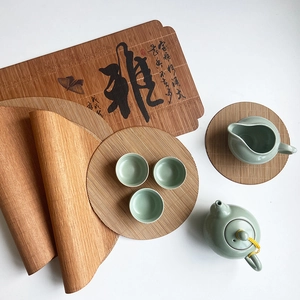 Handwoven bamboo tea mat set with Chinese calligraphy and heat-resistant coasters
