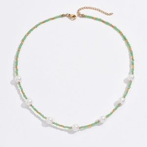 Bohemian colorful hand-woven seed bead necklace with white pearls and gold accents