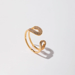 Detail of gold open double-layer ring featuring horseshoe elements and micro-pave zircons