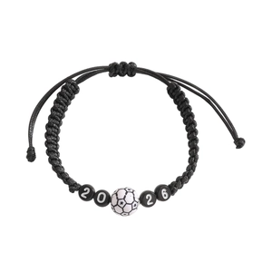 Macro detail of the 2026 World Cup soccer beaded bracelet with adjustable black braided cord