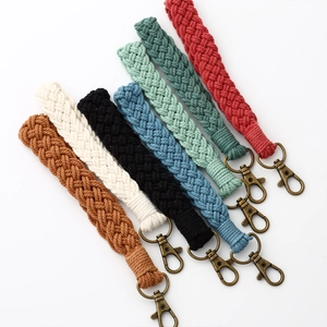 Handmade bohemian macrame wristlet keychains in eight assorted colors with bronze clasps