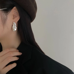 Minimalist 925 sterling silver asymmetric fluid earrings for women with lava texture