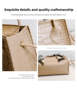 Détail du sac à main beige motif crocodile avec foulard et œillets dorés