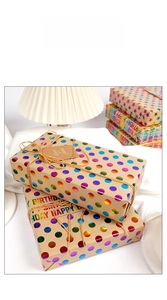 Detail of colorful metallic dot kraft paper wrap with hemp rope and gift tags