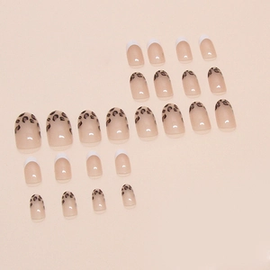 French tip press-on nails set with leopard print patterns and almond shape design