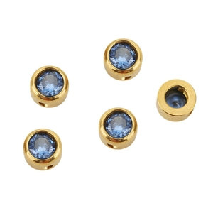 Five gold-plated stainless steel beads with blue zircon stones on white background