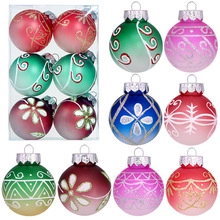 Close-up of 8cm foam Christmas balls with colorful glitter snowman and tree patterns