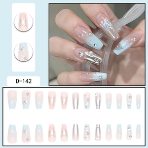 Pink and blue gradient press-on nails with silver butterfly and rhinestone accents