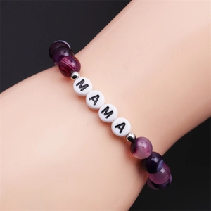 Detail of purple striped agate bead bracelet with MAMA letter beads and silver spacers