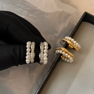 Elegant C-shaped silver and gold hoop earrings with double row pearls and rhinestones