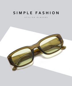 Detail shot of translucent olive-brown sunglasses frame with model 1806 laser engraving