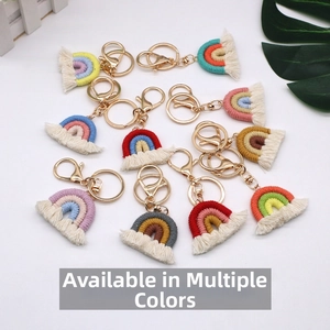 Detailed set of handmade rainbow cotton woven keychains with golden metal lobster clasps