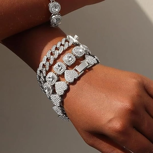 Golden hip hop chain bracelet set featuring square and heart diamonds on model wrist