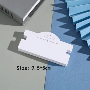 White 9.5x5cm jewelry display cards with hanging holes for necklaces and hair ties