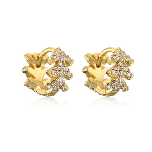 Pair of gold-plated copper Christmas tree hoop earrings with zircon stones on white background