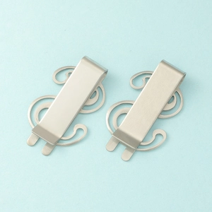 Pair of silver stainless steel dollar sign money clips with a brushed metal finish