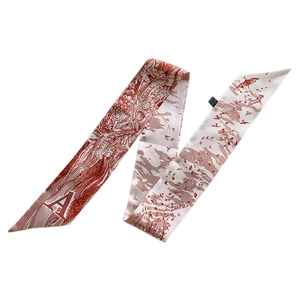 Detail of red and white Toile de Jouy silk scarf with forest motif and letter A