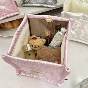 Quilted heart texture storage basket with lace trim and bows for organizing cosmetics