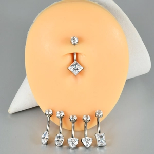 G23 titanium belly ring set featuring heart and marquise cut cubic zirconia stones