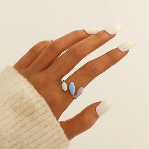 Detail of adjustable ring with colorful marquise shaped enamel leaves on hand
