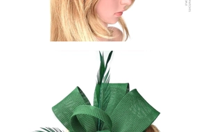 Detailed macro view of vintage green fascinator hat with elegant feathers and bow mesh texture
