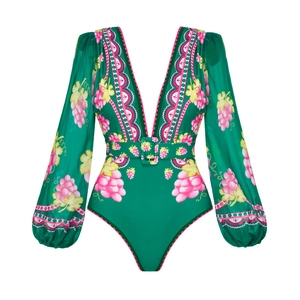 Detail of green long sleeve swimsuit with pink grape print, deep V-neck and buckled belt