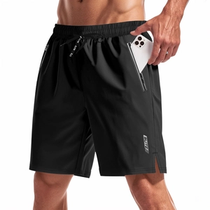 Close-up of quick-dry sports shorts with side zipper pocket for phone and elastic waist