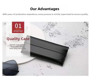 Detail of durable black leather glasses pouch with snap closure on marble surface