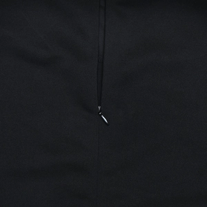 Detail shot of black dress fabric showing texture and high-quality invisible zipper