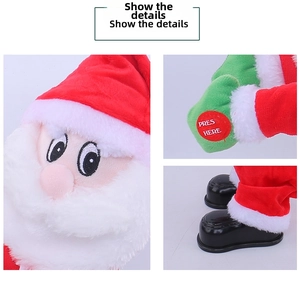 Details vom tanzenden Weihnachtsmann mit Musik-Knopf am Handschuh und Stiefeln