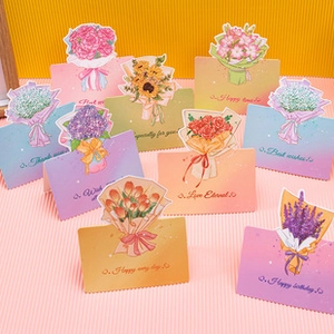 Close-up of floral greeting cards with assorted bouquet illustrations and wavy edges