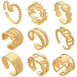 Set of 9 gold geometric titanium steel adjustable rings in various hollow styles