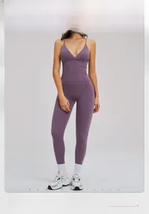 Detail of purple yoga set featuring a slim-fit camisole and high-waist sports leggings