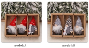 Detailed view of six Christmas gnome ornaments in red and grey knit with a snowy pine background
