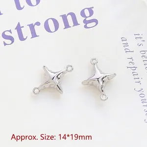 Close-up of silver four-pointed star pendant with dual rings, size 14x19mm for DIY jewelry