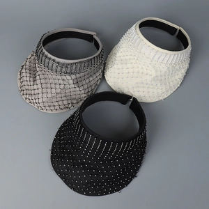 Close-up of three mesh sun visors with rhinestones in black, white and grey colors