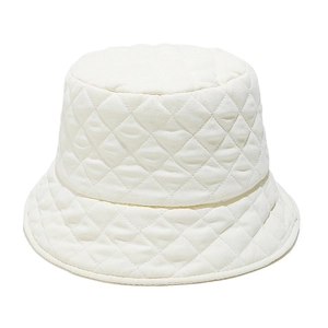 Detail of white quilted bucket hat featuring diamond stitching and padded cotton texture