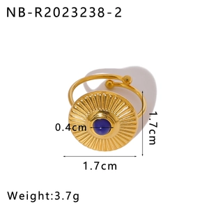 Detail view of adjustable gold ring with turquoise center and sunburst pattern dimensions