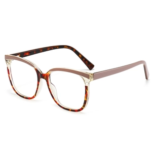 Retro cat-eye blue light glasses with tortoiseshell frames and brown spliced temples