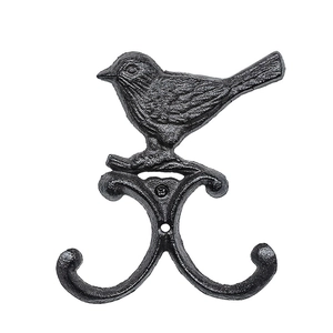 Vintage Wandhaken aus Gusseisen mit Vogelmotiv und Doppelhaken in klassischem Schwarz