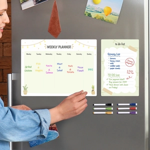 Applying magnetic weekly planner and to-do list with 6 markers on a steel fridge