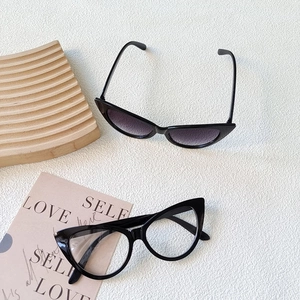 Set of two children's cat-eye sunglasses and clear glasses with stylish candy color frames