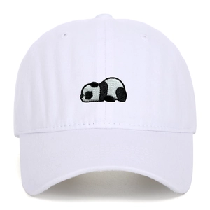 Close-up of a panda embroidery detail on a white vintage washed cotton baseball cap