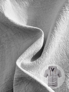 Vista macro della texture in lino grigio su questa camicia con cappuccio traspirante