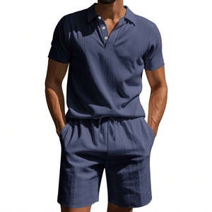 Close-up of slate blue linen polo shirt fabric texture and neat stitching details
