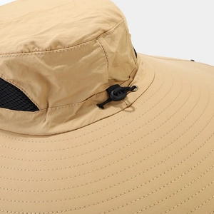 Close-up of khaki sun hat with breathable mesh and adjustable black drawstring