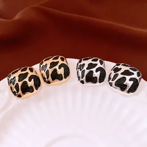 Vintage square enamel hoop earrings with leopard patterns in gold and silver finish