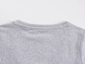 Detailed macro view of the double-stitched rear collar on a grey marl knit T-shirt